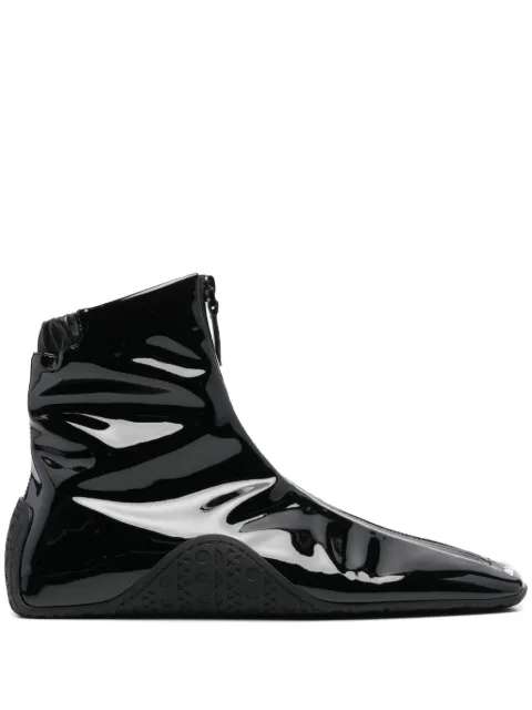 Alaïa Logo-embossed sneakers